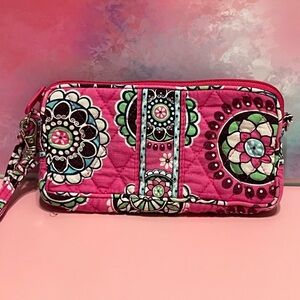 Pink Vera Bradley Wristlet used but in good condition. No rips or stains.